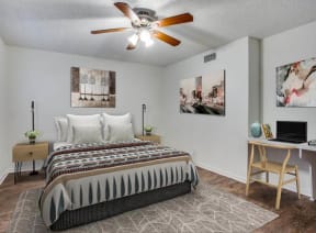 bedroom with a bed and a ceiling fan at THE EASTWOOD, AUSTIN, 78705