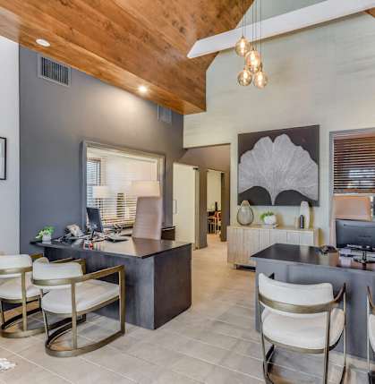 A modern office space with a wooden ceiling and grey walls. at Nobel Court, San Diego, 92122