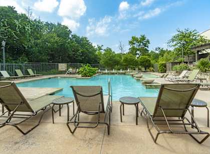 the swimming pool at the preserve at polo towers apartments