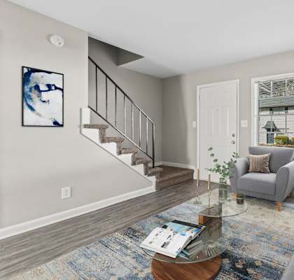 a living room with a couch and a table