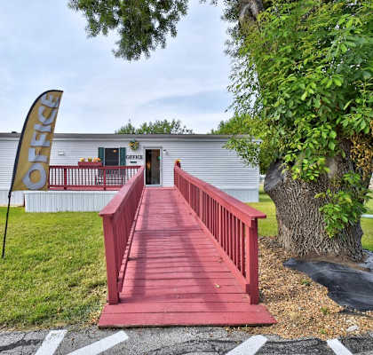 Red bridge in front of office at Country Oaks, San Antonio, TX, 78253