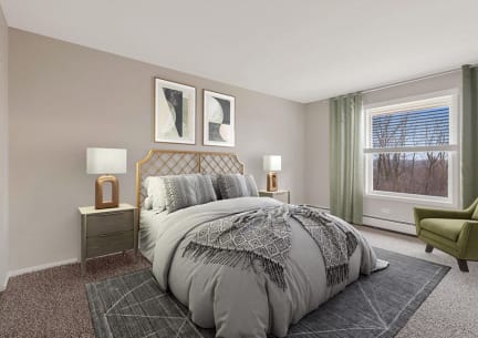 a bedroom with a large bed in a room
