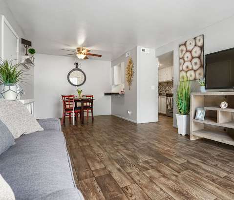 a living room with a couch and a tv