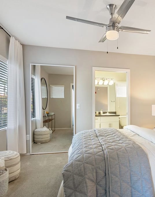 a bedroom with a large bed and a ceiling fan at Element Deer Valley in Phoenix, Arizona 85027
