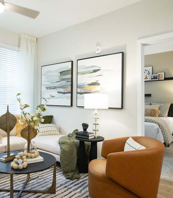a living room with a couch and a table