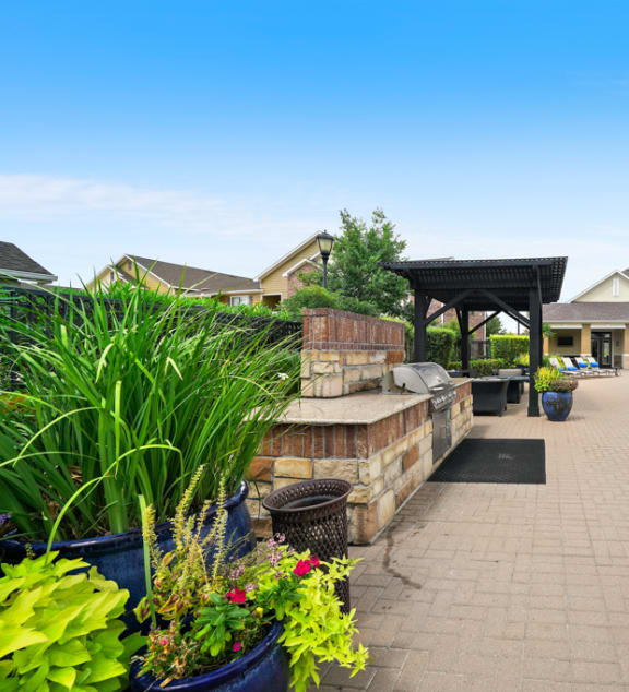 swimming pool area at Grand Villas Apartments, Katy