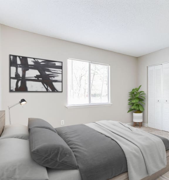 a bedroom with a bed and a door to a living room at Lory of Harbison, Columbia, SC