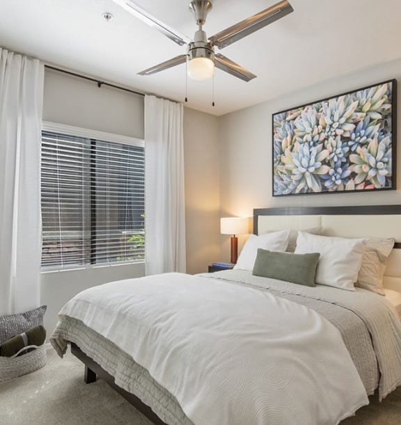 a bedroom with a bed and a ceiling fan at Element Deer Valley in Phoenix, AZ 85027