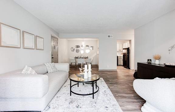 A living room with a white couch and a coffee table.at Laurel, Union City