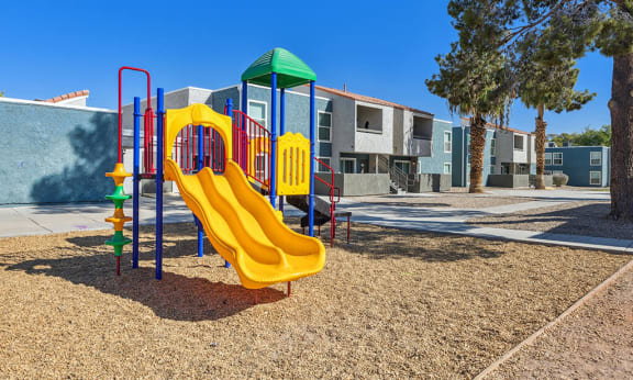 Exterior Playground at Woodcreek Apartments in Las Vegas NV