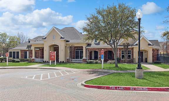 Leasing office exterior at Ironwood Crossing Apartments and Townhomes in Fort Worth TX