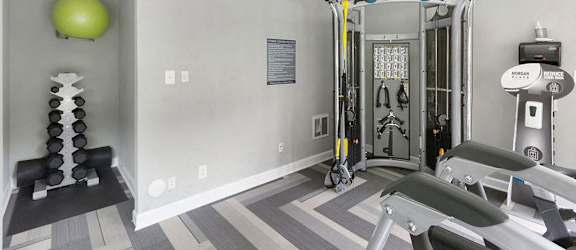 the gym at the flats at big tex apartments