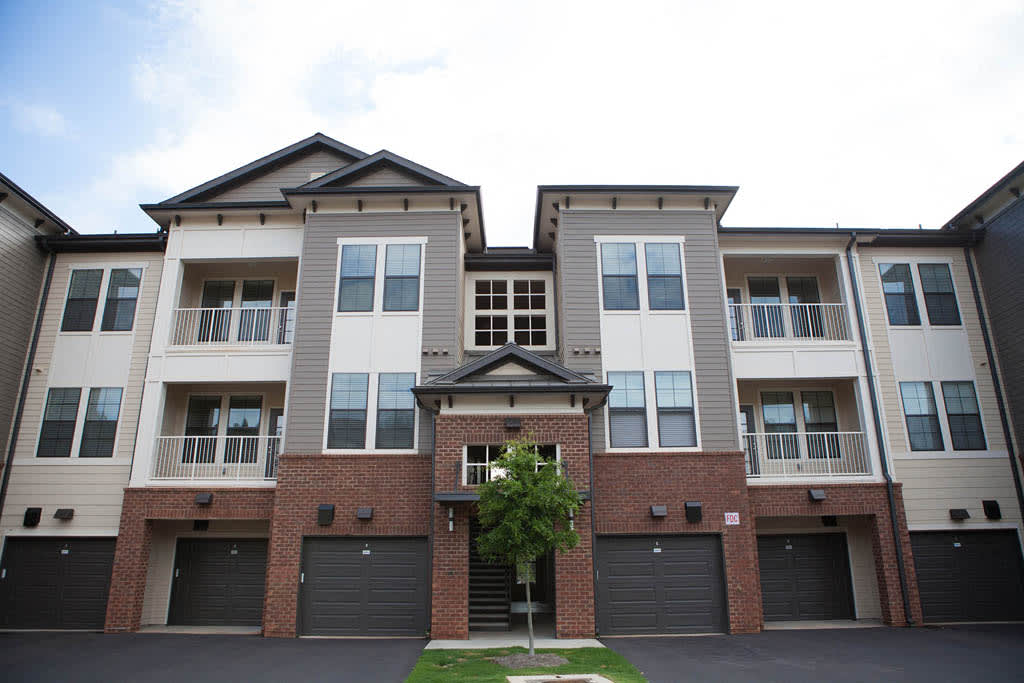 Velo Verdae Apartments exterior with garages and balconies - Greenville, SC