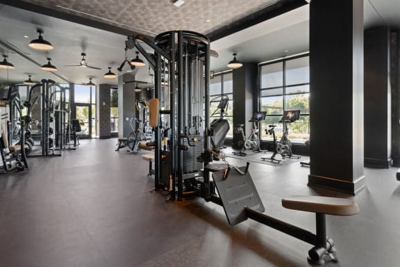 the gym has weights machines and other exercise equipment at Madison West Elm, Conshohocken, 19428