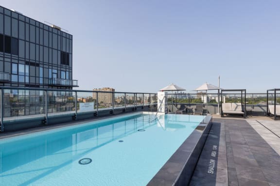 a view of the rooftop pool at the graduate madison hotel in madison, wi