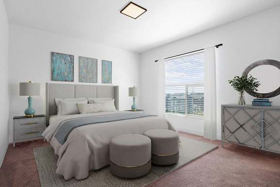 A bedroom with a large bed and a round mirror on the dresser.