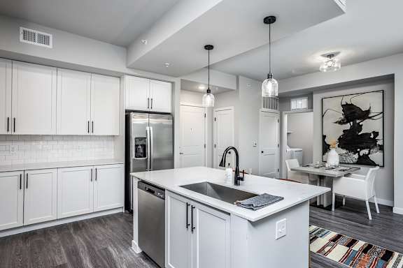 Fully-equipped kitchen and dining area in model