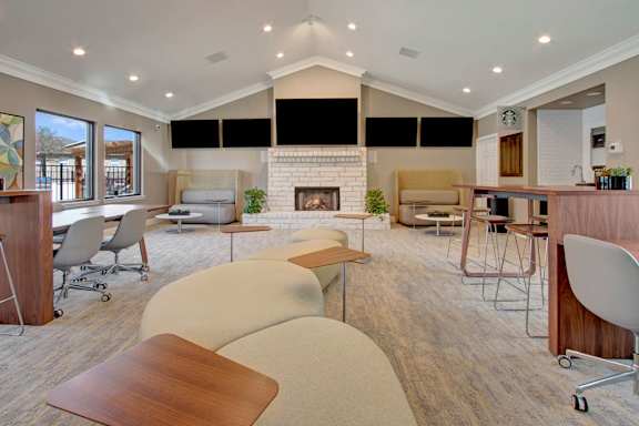 A modern living room with a fireplace and a dining area.