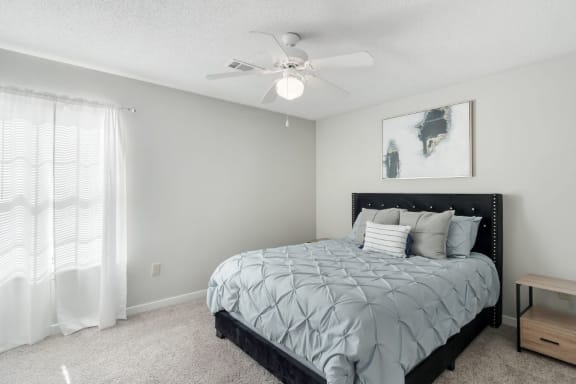 Modern Bedroom at The Pointe Apartment Homes in MS 39553