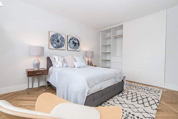 Bright one bedroom apartment with large custom built in closets