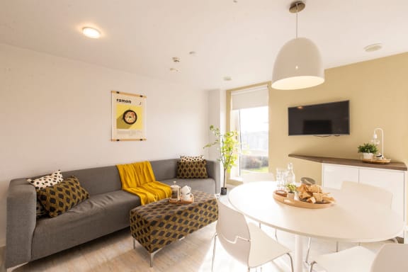 a living room with a couch and a table