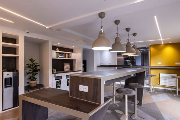 a kitchen and dining area in a modern apartment