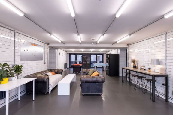 a living room with a couch and a table