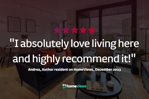 a living room with a table and a quote saying i absolutely love living here