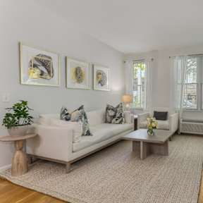 Living room with White Couch at The Glover House Apartments, Washington, DC, 20007