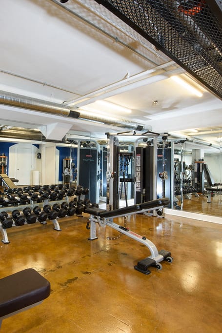 the gym has weights and cardio equipment in it at Queen Anne Belvedere, Maryland, 21201