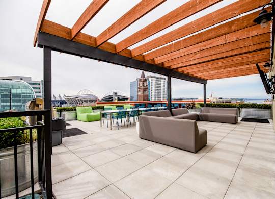 Apartments in Seattle, WA - Icon Apartments Rooftop Deck with BBQs and City Views at Icon Apartments, Seattle, 98104