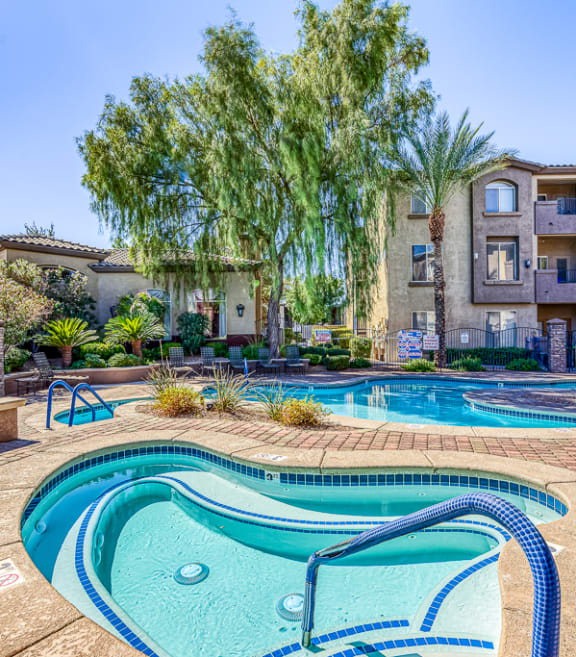the preserve at ballantyne commons pool and spa with apartment buildings