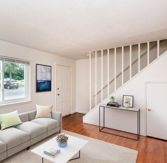 Living Room with Hardwood Floors and Stairs at Rolling Green Apartments, Massachusetts