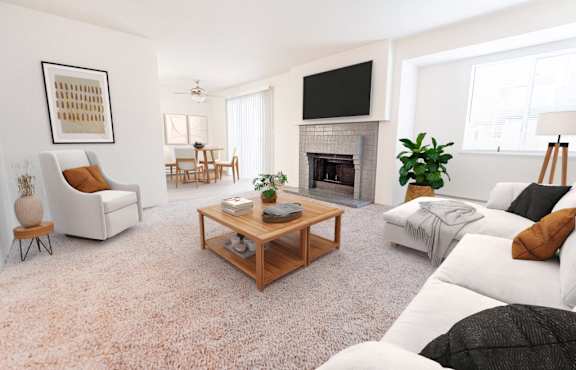 The Lucent Apartments in Tacoma, Washington Model Living Room with Fireplace and Dining Area