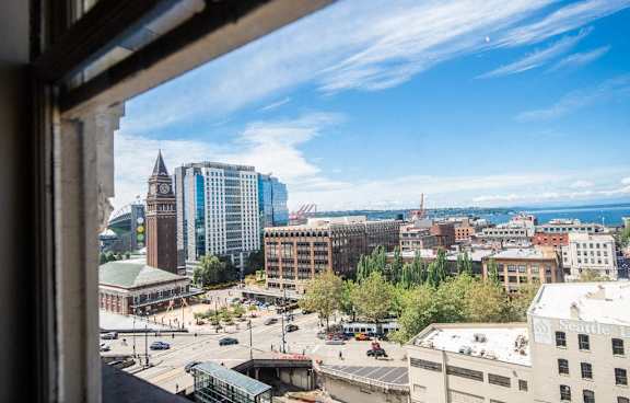 a view of the city from a window of a building at Addison on Fourth, Seattle, 98104