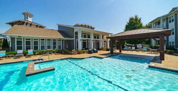 the preserve at ballantyne commons pool with apartment buildings in the background