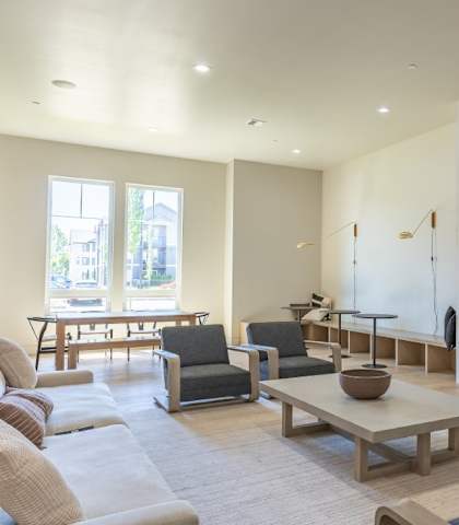 A living room with a television and a fireplace at Northplace Apartment Homes, Oregon