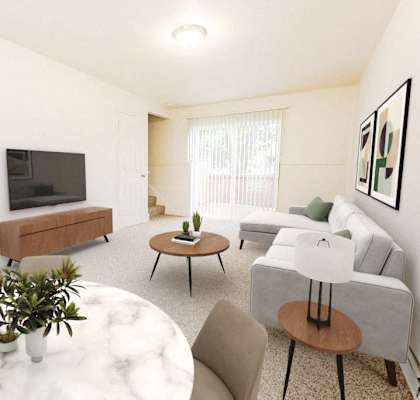 a living room with a couch and a table