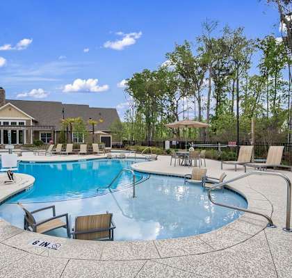 a swimming pool and lounge area at Sterling Creek, Richmond Hill