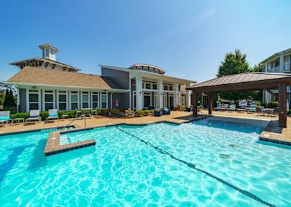 the preserve at ballantyne commons pool with apartment buildings in the background