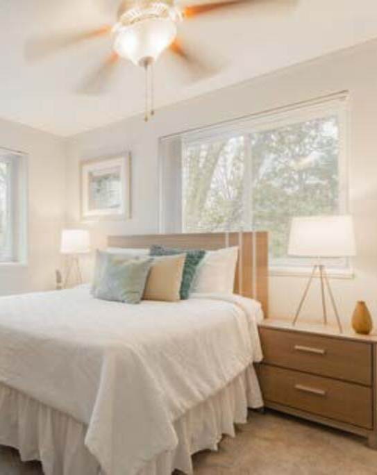 Bedroom With Ceiling Fan at Greenbelt Properties, Greenbelt, MD