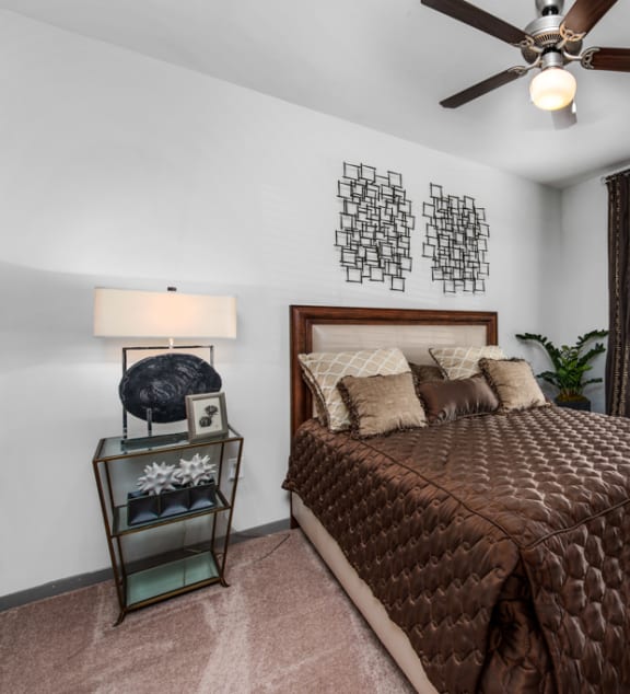 a bedroom with a large bed and a window at Avenues at Tuscan Lakes, League City, TX