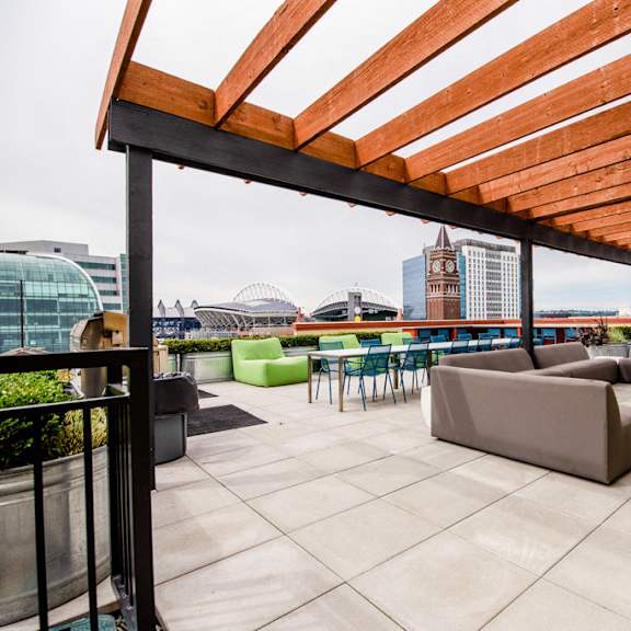 Apartments in Seattle, WA - Icon Apartments Rooftop Deck with BBQs and City Views at Icon Apartments, Seattle, 98104