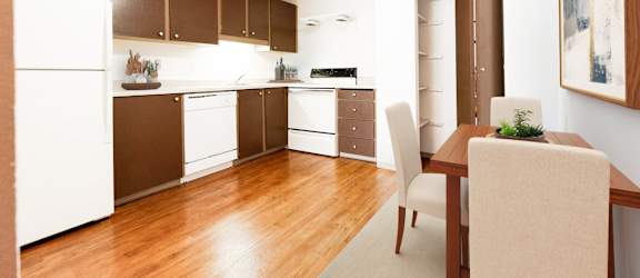 Spacious Kitchen with Brown Cabinets at Harbor Oaks, Washington, 98388