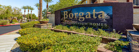 a sign forboraza development homes in front of a building