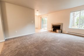 Tacoma Apartments - Notch8 Apartments - Living Room, Fireplace, Dining Room, and Patio