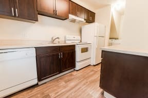 Lakewood Apartments - Pacific Walk Apartments - Kitchen and Laundry