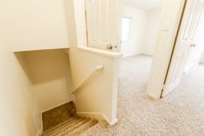 Lakewood Apartments - Pacific Walk Apartments - Top Floor Landing, Stairs, and Bedrooms