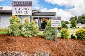Sumner Apartments - The Retreat Apartments - Leasing Office Exterior and Community Mascot