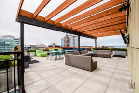 Apartments in Seattle, WA - Icon Apartments Rooftop Deck with BBQs and City Views